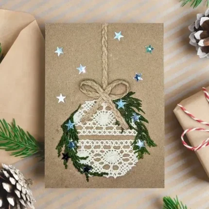 Handmade-Christmas-card-with-a-lace-ball-and-wreath-design