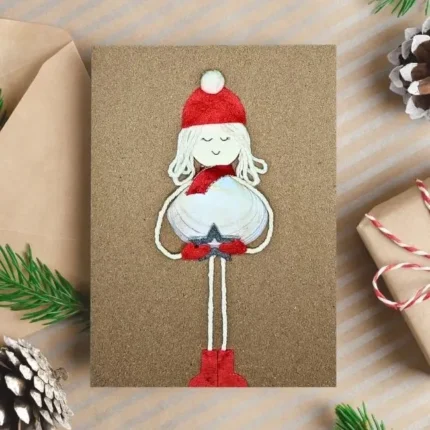 Hamemade-Christmas-card-with-snowgirl-made-of-seashell