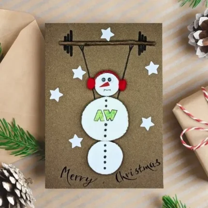 Unique-Handmade-Christmas-card-for-fitness-instructors-with-a-snowman-lifting-barbells