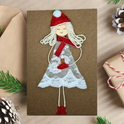 Hamemade-Christmas-card-with-snowgirl-made-of-lace