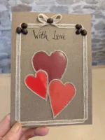 Personalised-Handmade-Valentines-Day-Card-three-hearts-held-in-hand