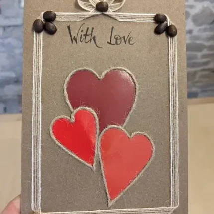 Personalised-Handmade-Valentines-Day-Card-three-hearts-held-in-hand