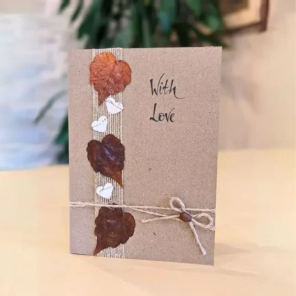 Handmade-Valentines-Day-Card-with-Dried-Leaves-and-Paper-Hearts