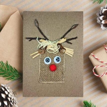 Handmade-Christmas-card-with-reindeer-made-of-natural-materials-with-giggle-eyes